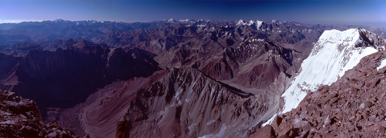 View from the summit of Aconcagua into the south wall. The Confluencia (3300m) campsite is located at the confluence of two valleys.